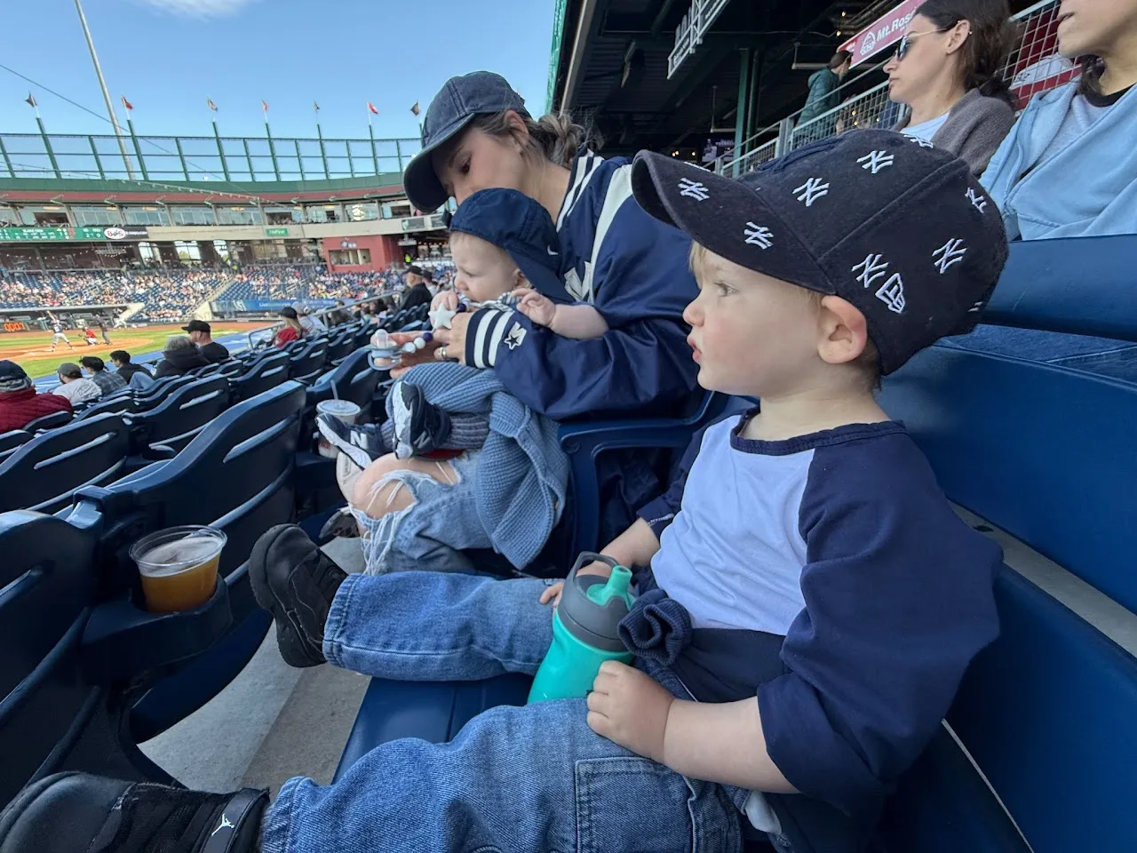 Michael's family enjoying a baseball game